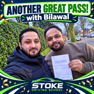 Two men standing tougher with a pass certificate