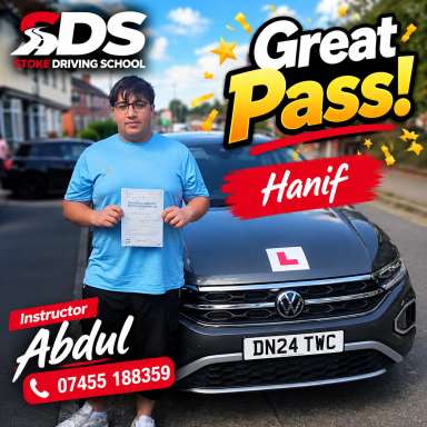 Stands in front of a vehicle with a driving test pass certificate