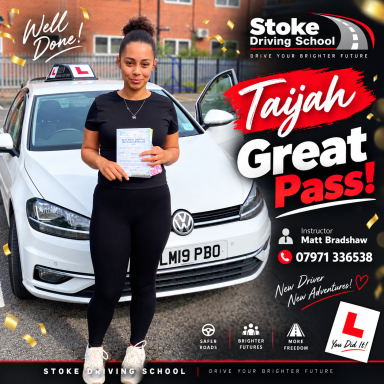Well done Taijah A young girl too big standing in front of a white vehicle with her Pass certificate
