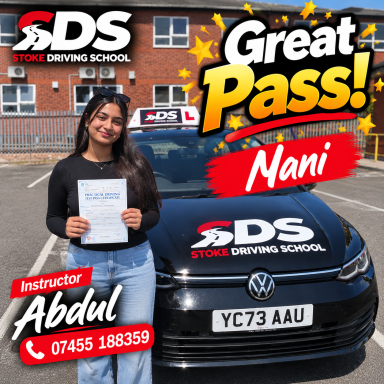 Women in front of car with a pass certificate